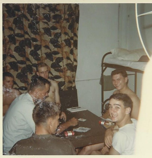 Playing cards in Saigon. Gary Finco on the right with no shirt